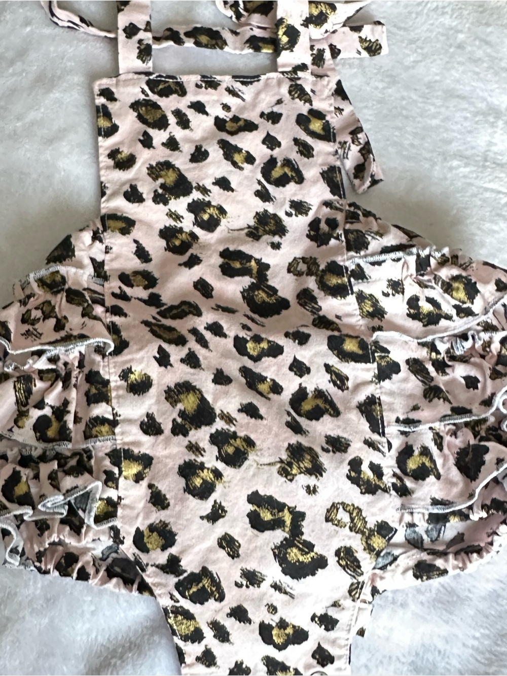 Pink Leopard Print One-Piece Swimsuit with Gold Accents